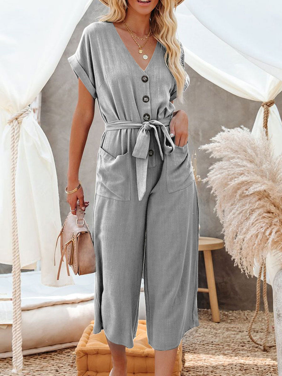 Schwarzer Jumpsuit mit Knöpfen und Knoten, weit, für den Sommer, einteiliges Outfit 