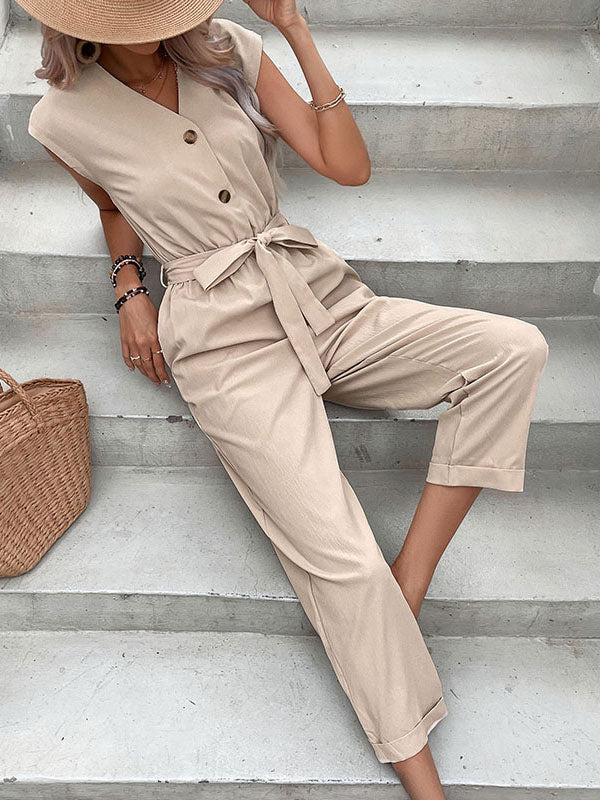 Aprikosenfarbener Sommer-Jumpsuit mit V-Ausschnitt, einteiliges Outfit 