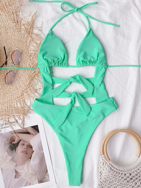 Sexy Solid Color Bandage Hollow One-Piece Swimsuit